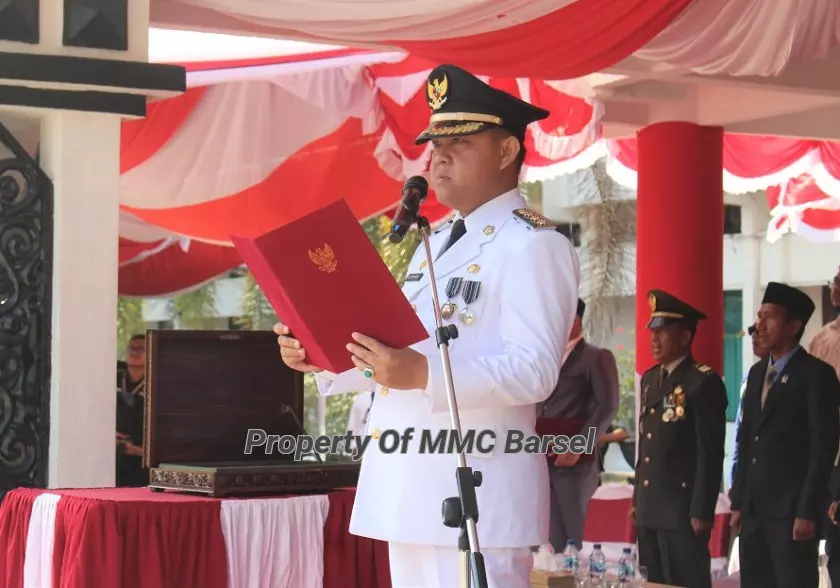 Pembacaan Naskah Proklamasi oleh Pj.Bupati Barsel H. Deddy Winarwan (Foto:R1/Elza/Dien/JN)